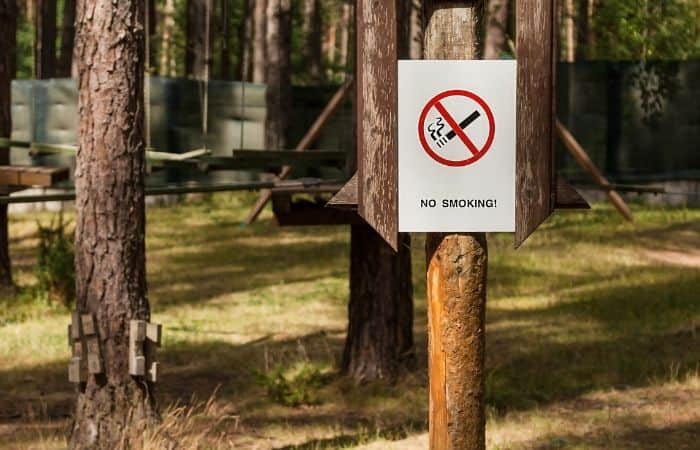 A sign that say No Smoking on National Park